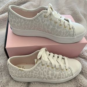 Kate spade for Keds sneakers in white leopard print with gold accents.  EUC